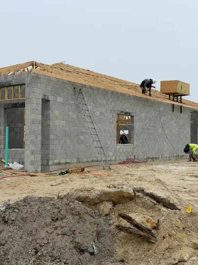 Roof workers on construction site
